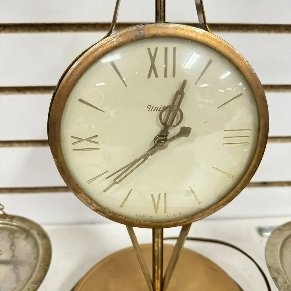 Vintage United Metal Goods Mfg. Scale Of Justice Electric Table Top Clock No 207